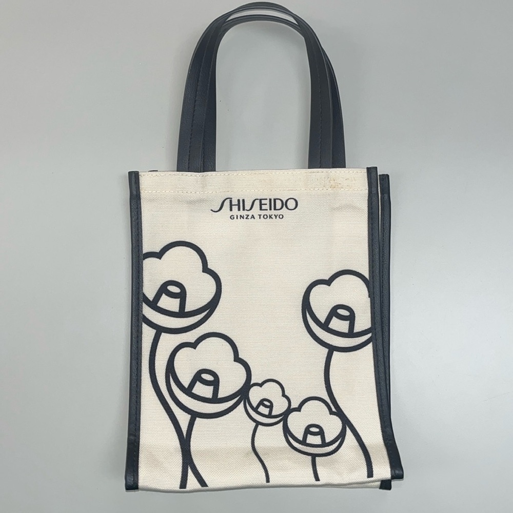 Shiseido small cream / black tote with handles, preowned